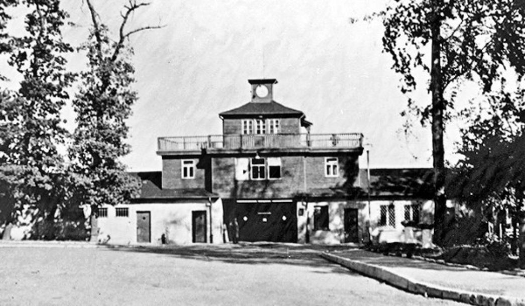 View of the gate of Special Camp No. 2. the gate of the former Buchenwald concentration camp is almost unchanged, but the barred iron gate is boarded up. the SS lettering: "To each his own" is thus obscured."
