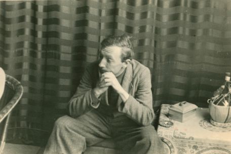 Private photo of Franz Monjau sitting, resting his arms on his legs.