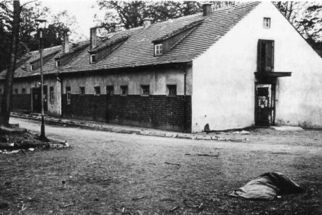 Exterior view of the horse stable, which housed the neck-shooting facility. It is an elongated two-story building.